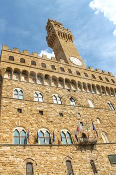 Flags on the balcony of the Palazzo Vecchio. Florence, Italy 