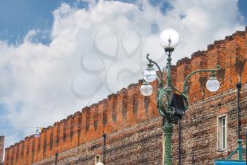 Lantern near the medieval walls of Verona, Italy