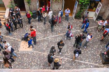 VERONA, ITALY - MAY 7, 2014: Tourists in the courtyard of Juliet's house. Verona, Italy