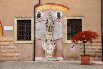 VERONA, ITALY - MAY 7, 2014:  Statue in the courtyard of the Palazzo del Capitano, Piazza Dante, Verona, Italy