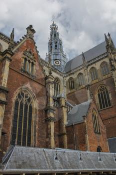 The bell tower of the Grote Kerk (Sint-Bavokerk) in the  historic center of Haarlem, the Netherlands