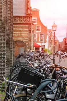 Parked bicycles on the street in the historic center of Haarlem, the Netherlands
