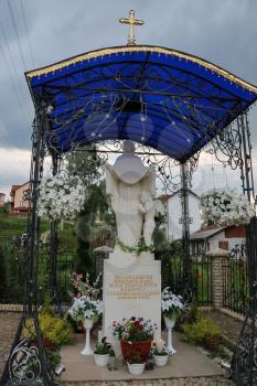 Schodnica, Ukraine - June 30, 2014: Statue of Virgin Mary, Mother of God in Carpathians