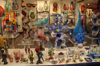 Venice, Italy - August 13, 2016: Traditional Venetian souvenirs in gift gallery in historic city centre