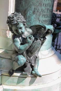 Bronze baby at base of Alessandro Farnese monument, Duke of Parma (by Alessandro Mochi). Piacenza, Italy