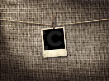 Royalty Free Photo of an Old Photo on a Clothesline