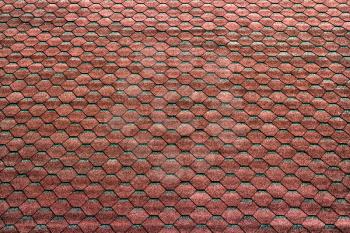 red hexagonal tiles on the roof as a background