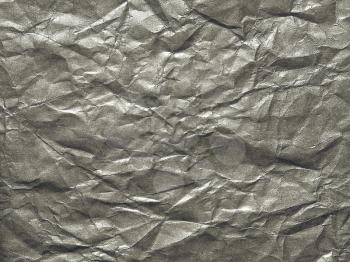 silver crumpled paper as a background