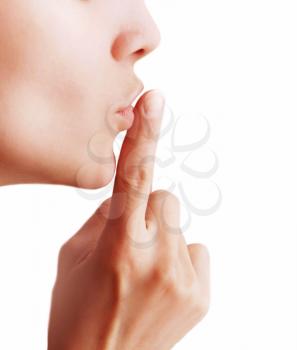 Girl with a gesture of shh isolated on a white background