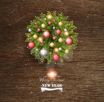 Christmas Card With Pine Branches And Christmas Balls On a Wooden Background