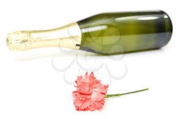 Royalty Free Photo of a Flower and Bottle of Champagne