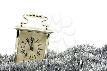 Royalty Free Photo of a Clock and Garland