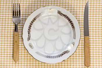 Royalty Free Photo of a Plate and Utensils