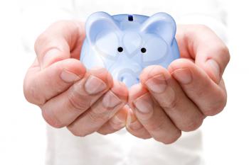 Royalty Free Photo of a Person Holding a Piggy Bank