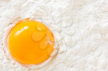 yellow egg yolk in the white flour 