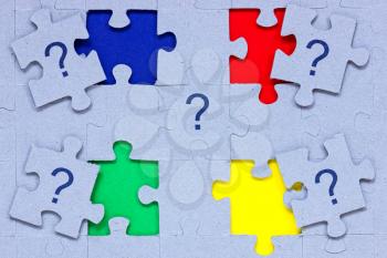 Royalty Free Photo of a PUzzle With Pieces Out