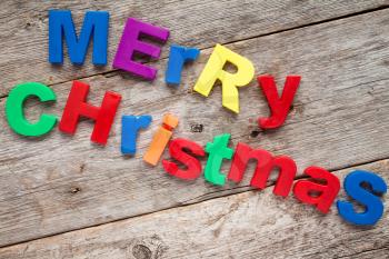 Merry Christmas message written in a colorful plastic letters