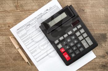 Calculator and tax form which confirms the payment of the tax in the USA