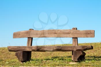 Wooden bench with the look at blue sky 