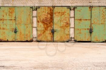 Metal garage doors of old industrial building