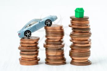 Savings to buy a home or buy real estate or car. Conceptual image.