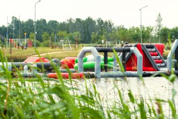 Inflatable playground for children in the lake