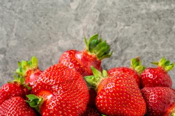 Pile of fresh red ripe strawberries, close-up view
