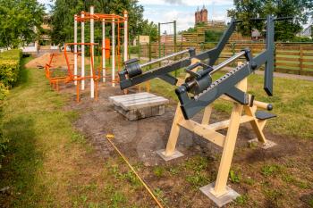 New exercise machines being installed. New training complex in the courtyard of a school.