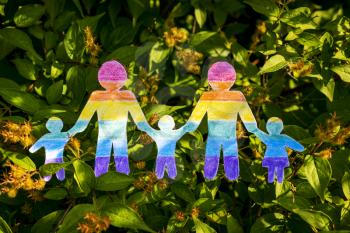 Paper cut same sex family on the park, lgbt concept