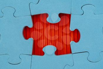 Fill the missing part fragment of blue jigsaw puzzle. Concept for success