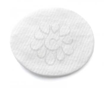 One cotton pad on white background