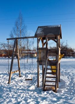 Children hillock in winter period on open area