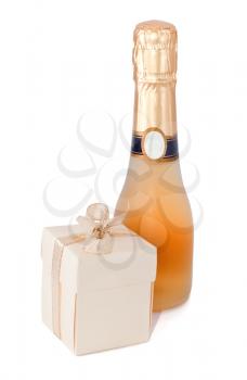 Gift box with champagne on white background