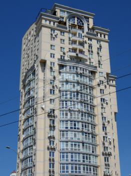 High building on blue sky background, Kyiv, Ukraine
