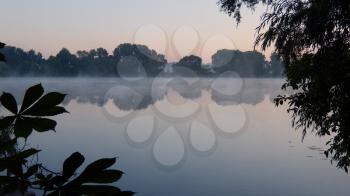 blue pond before sunrise, nature scene