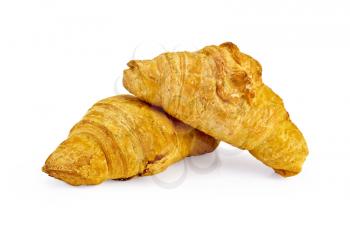Two golden croissant isolated on white background