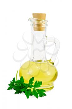 Vegetable oil in a glass carafe with a sprig of parsley isolated on white background