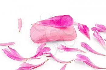 Soap pink with peony petals isolated on white background