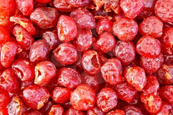The texture of the large dried candied cherries