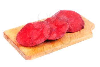 Royalty Free Photo of Sliced Beets on a Cutting Board