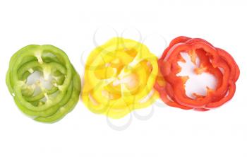 Royalty Free Photo of Red, Green and Yellow Pepper Slices