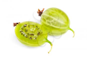 Whole and sliced green gooseberry fruit closeup with seed on white background 



