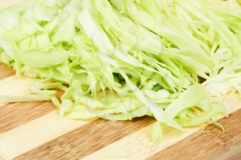 Green  cabbage sliced  on  cutting  board