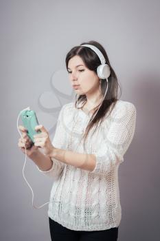 girl listening to music from your phone