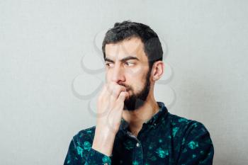 portrait of a thinking man with a beard