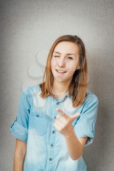 girl mocking and pointing her finger