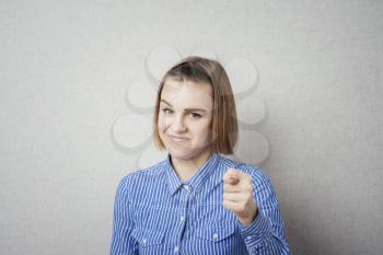 attractive woman showing fig gesture isolated