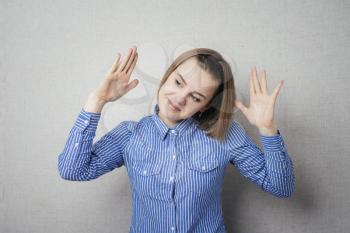 picture of young happy woman with hands up
