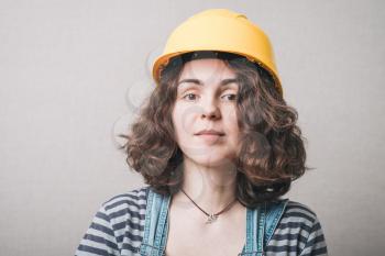 portrait of a girl in a yellow helmet