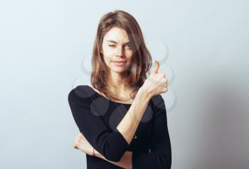 Young Woman Showing Thumb Up